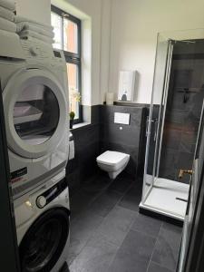 Koupelna v ubytování Alte Kammfabrik OG