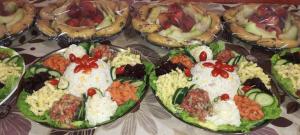 a table topped with plates of food with different foods at Auberge Lion de l'Atlas in Azrou +10 photos