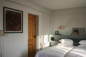 En eller flere senge i et værelse på Big Red Barn - Spectacular Villa