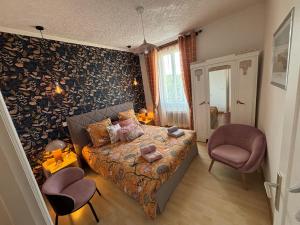 Postel nebo postele na pokoji v ubytování Gîte de la Coussotterie Sud Vendée 4 **** 8 pers