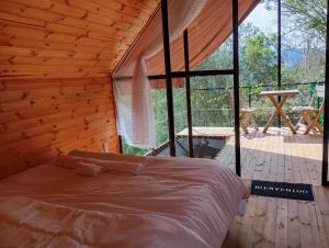 Φωτογραφία από το άλμπουμ του Ecocabañas ByB Cabaña de lujo con jacuzzi Santi σε Choachi +12 φωτογραφίες