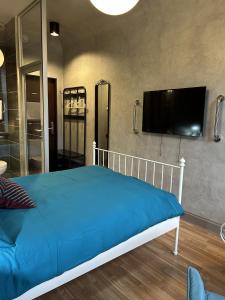 TV a/nebo společenská místnost v ubytování RedDoor Apartaments