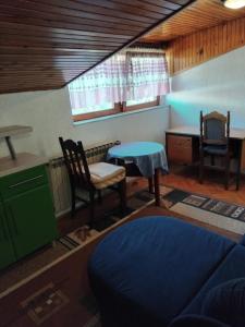 Ένα ή περισσότερα κρεβάτια σε δωμάτιο στο Apartman Buco