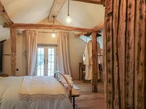 En eller flere senge i et værelse på The Cow Shed