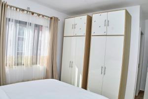 Postel nebo postele na pokoji v ubytování Juwell Haven