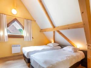 Ένα ή περισσότερα κρεβάτια σε δωμάτιο στο Lac Bleu nr 14 +13 φωτογραφίες