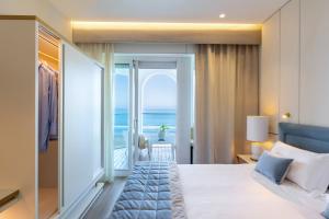 Postel nebo postele na pokoji v ubytování Hotel Tiffany's + 99 fotografií