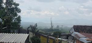 a view of a city with buildings and trees at Aparto hotel del centro in Filandia