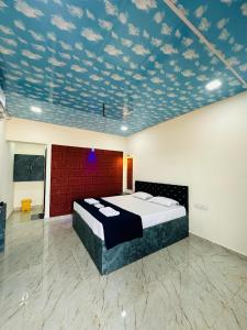 Postel nebo postele na pokoji v ubytování Beach and Hills Resort Diveager