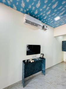 TV a/nebo společenská místnost v ubytování Beach and Hills Resort Diveager