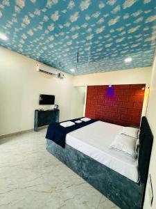 Postel nebo postele na pokoji v ubytování Beach and Hills Resort Diveager