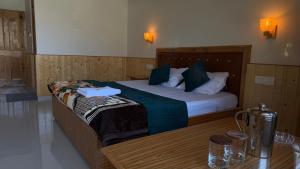 Postel nebo postele na pokoji v ubytování Himaja Retreat