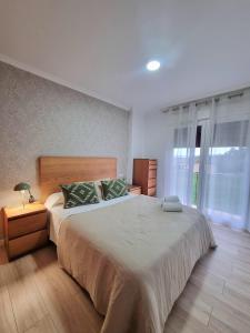 Postel nebo postele na pokoji v ubytování Apartamento Estudio con Wifi, Piscina y Parking