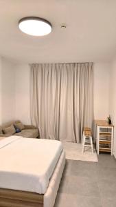 Postel nebo postele na pokoji v ubytování Kuro Elegant Living by Shiro Elegant Holiday Homes + 12 fotografií