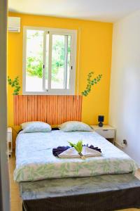 Ένα ή περισσότερα κρεβάτια σε δωμάτιο στο La Villa du Sommet +16 φωτογραφίες