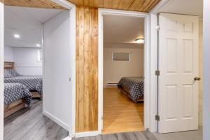 Ένα ή περισσότερα κρεβάτια σε δωμάτιο στο Kôté Lac