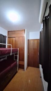 Postel nebo postele na pokoji v ubytování Minidepa completo 4camas a 9min del ADO 12min del aeropuerto