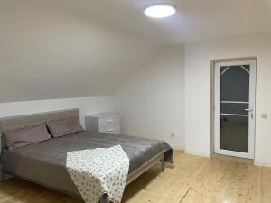 Ένα ή περισσότερα κρεβάτια σε δωμάτιο στο Hankavan HANKA HOME