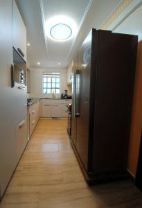 Η κουζίνα ή μικρή κουζίνα στο Zanzi Airport Transit Hub 10 min from JKIA