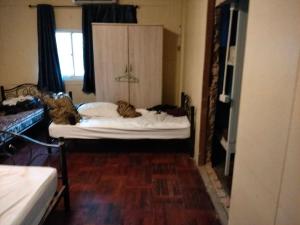 Postel nebo postele na pokoji v ubytování A classic hostel next to W district food market + 6 fotografií