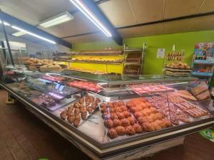 a bakery filled with lots of different types of food at Chalet D'Mar in Wenduine