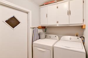 a laundry room with a washer and dryer at Heart of Greensboro Pet-Friendly Gem 3 Mi to Dtwn in Fisher Park +16 photos