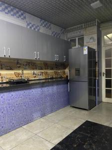 Kuchyň nebo kuchyňský kout v ubytování Mameen + 14 fotografií