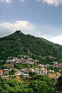 a town on top of a hill with houses at The Heart of Moutoullas in Moutoullas