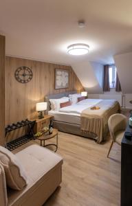 Postel nebo postele na pokoji v ubytování Gästehaus zum roten Hahn