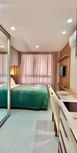 Ένα ή περισσότερα κρεβάτια σε δωμάτιο στο EsTilo & CoNfoRto no Melhor da CiDade c/ PisCiNA