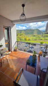 Γενική θέα στο βουνό ή θέα στο βουνό από  αυτό το δωμάτιο σε οικογενειακή κατοικία