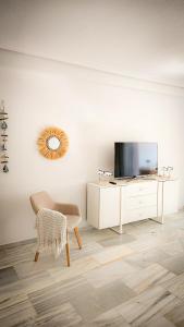 Μια τηλεόραση ή/και κέντρο ψυχαγωγίας στο Calpe Cycling