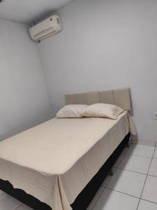 Ένα ή περισσότερα κρεβάτια σε δωμάτιο στο Casa Encanto Belém +14 φωτογραφίες