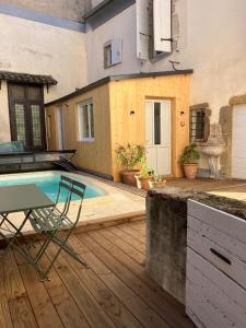 Bassein majutusasutuses Maison de charme avec plafonds et parquets anciens või selle lähedal