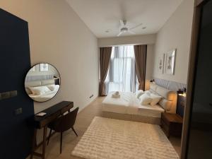 Una cama o camas en una habitación de Star Residance KLCC by Nexus