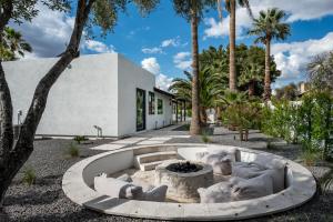 a courtyard with a fire pit in front of a building at The MYAH by Porter NEWLY REMODELED Enjoy the Pool Firepit Luxury in Phoenix
