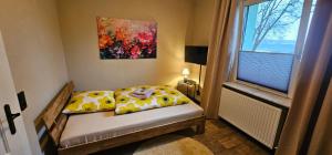 Postel nebo postele na pokoji v ubytování Ferienhaus Kiara