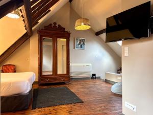 TV a/nebo společenská místnost v ubytování T1 Cocon de charme & confort, Amiens centre