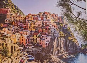 a group of houses on the side of a mountain at La Casa in Vrnjačka Banja