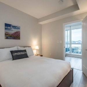 Llit o llits en una habitació de Corporate Stays Killick 2 Bedroom