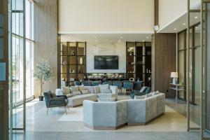 Μια τηλεόραση ή/και κέντρο ψυχαγωγίας στο Corporate Stays Monarc 2 Bedroom