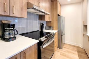 Køkken eller tekøkken på Corporate Stays Blum 1 Bedroom