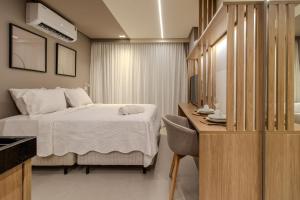 Ένα ή περισσότερα κρεβάτια σε δωμάτιο στο Flat a 260m da praia Way - MyFlats