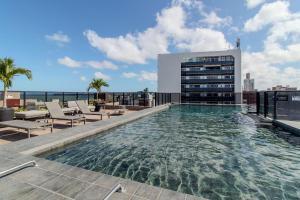 Πισίνα στο ή κοντά στο Flat a 260m da praia Way - MyFlats +27 φωτογραφίες