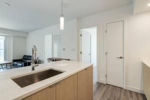 Η κουζίνα ή μικρή κουζίνα στο Corporate Stays Sodo 2 Bedrooms +29 φωτογραφίες