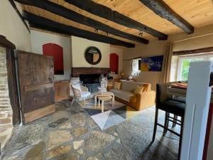 Posezení v ubytování Le Mas de Laché