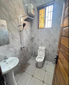 Koupelna v ubytování Serengeti Safari Inn