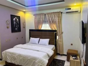 Postel nebo postele na pokoji v ubytování Gold royal