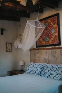 Ένα ή περισσότερα κρεβάτια σε δωμάτιο στο Cabañas Claudia