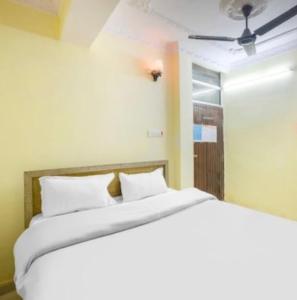 Ένα ή περισσότερα κρεβάτια σε δωμάτιο στο Rinchen Stay